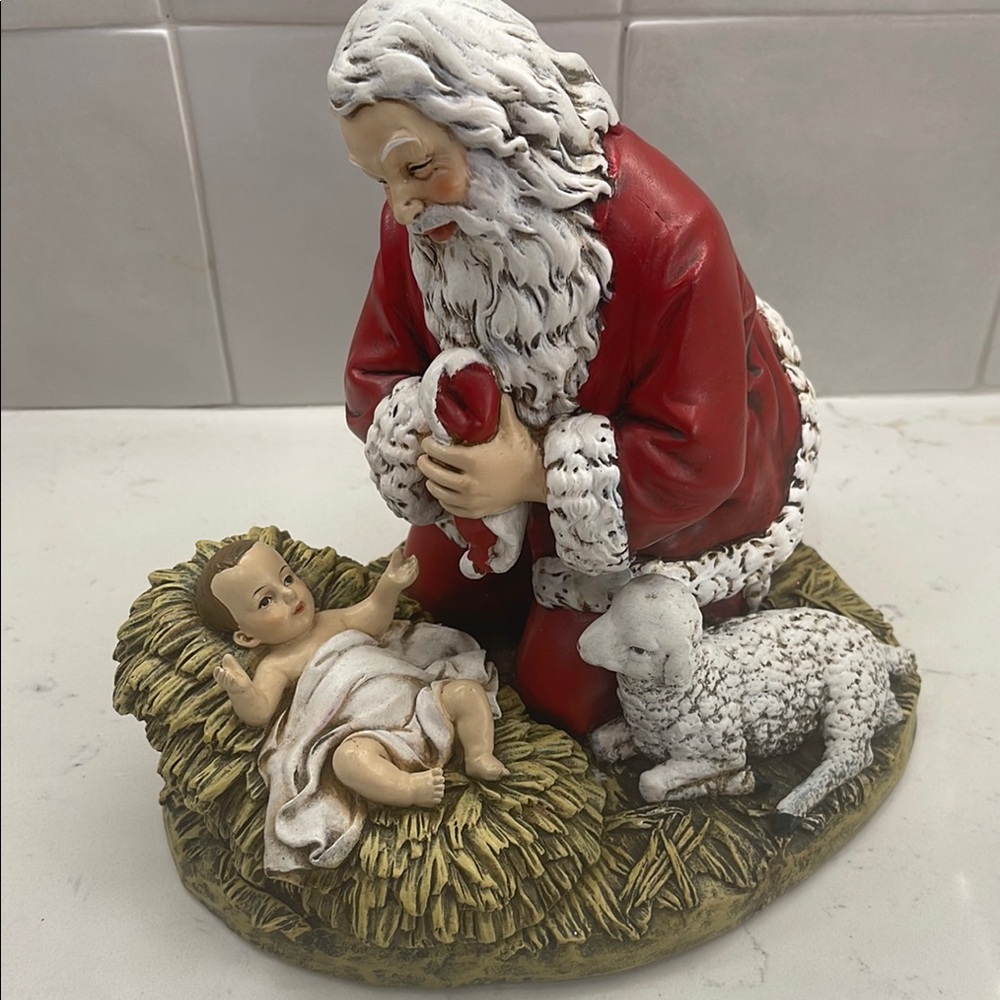 Joseph Studio  by Roman -Kneeling Santa and baby Jesus